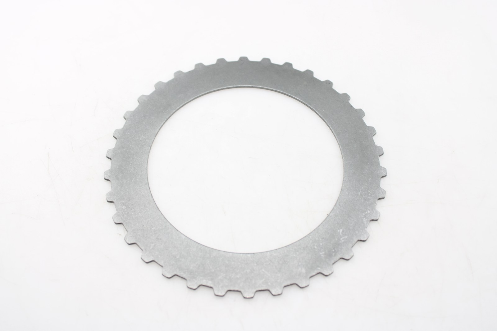 7DBBB43D6C6E2D2C549054A3BDF26C9B.JPG Tarcza stalowa aod 99x1. 8 mm 34z 34t 4r70e/4r70w/4r75e | automatyczni gm | części do automatycznych skrzyń biegów